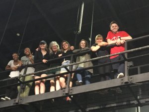 KO Festival interns and Technical Director Holly Gettings on the catwalk of the Holden Theater